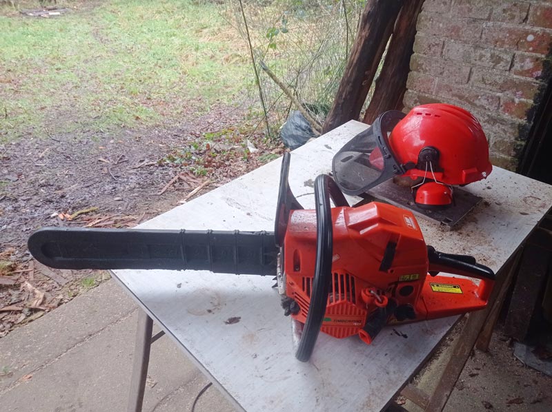 Chainsaw and safety helmet